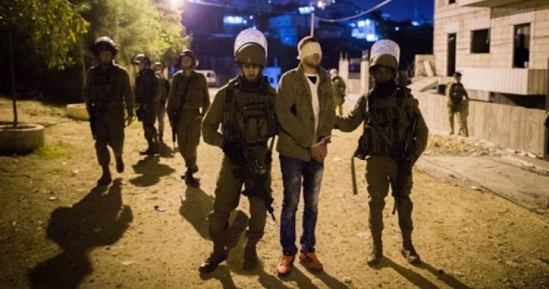IOF arrests 21 West Bank Palestinians in overnight sweeps