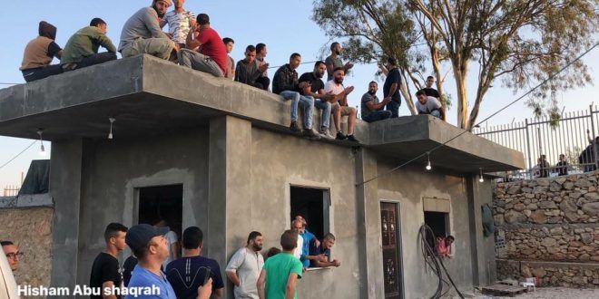 Palestinians gather inside demolition threatened homes in Walaja