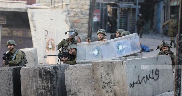 Two Palestinian youths injured in IOF raid west of Jenin