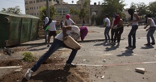 Intifada young men stone settlers cars south of Bethlehem