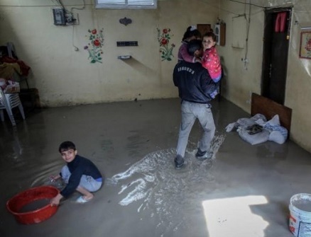 Snow flurries expected, Palestinian houses sinking