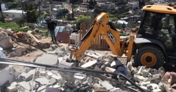 IOA forces family to raze agricultural structures in Jlem