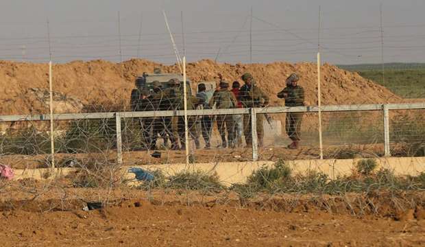 Israeli army detains two young men north of Gaza border