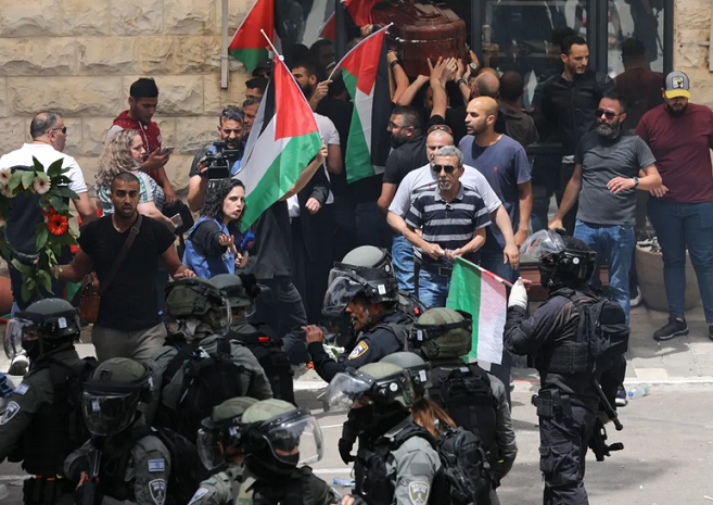 Report: Israel Shin Bet, police had dispute over handling of Shireen Abu Akleh's funeral