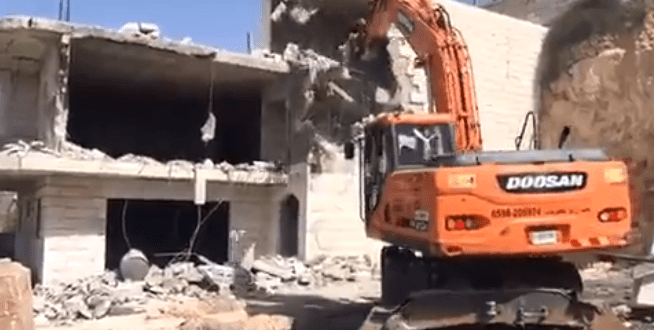 IOF demolish two apartments and four warehouses in Shuafat camp