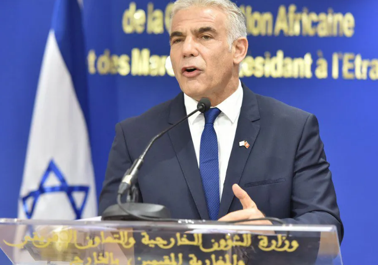 Israel's Lapid urges world to keep up pressure on Iran