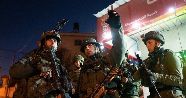 Israeli forces detain 20 Palestinians in West Bank raids