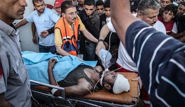 Palestinian young man shot at Gaza protest dies of injury