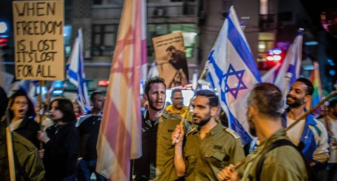 Israel fires army officer for 'protesting in uniform'