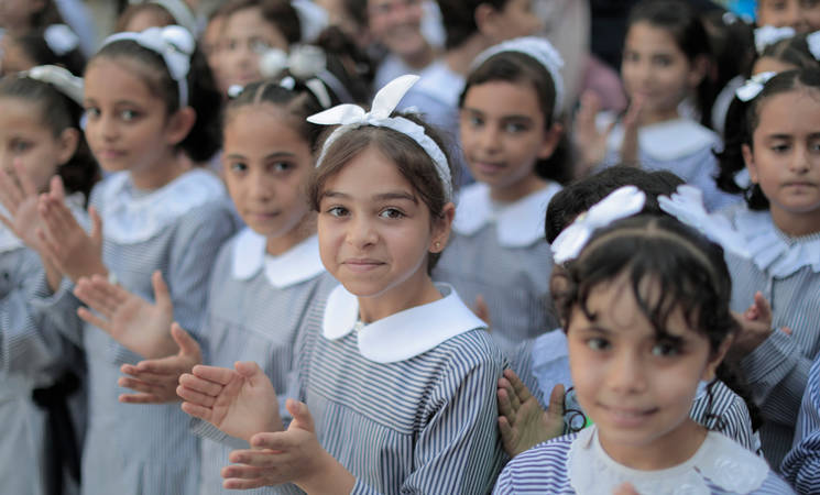 More than half a million Palestine refugee children go back to UNRWA schools