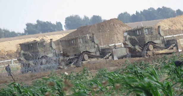 Israeli army bulldozers enter Gaza, level lands