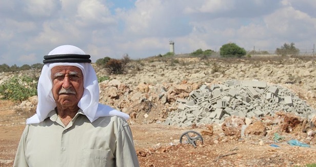 Haunted by his love for a land robbed by the separation wall