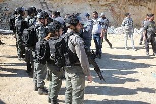 Israeli Soldiers Arrest Palestinian Man for Defending His Wife