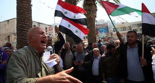 Palestinians demonstrate in West Bank city in support of Syria