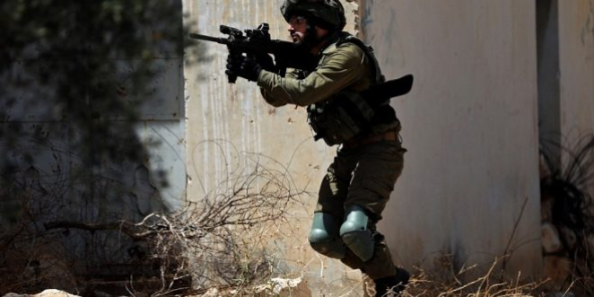 Palestinian youth wounded by Israeli bullets during clashes in Ramallah district