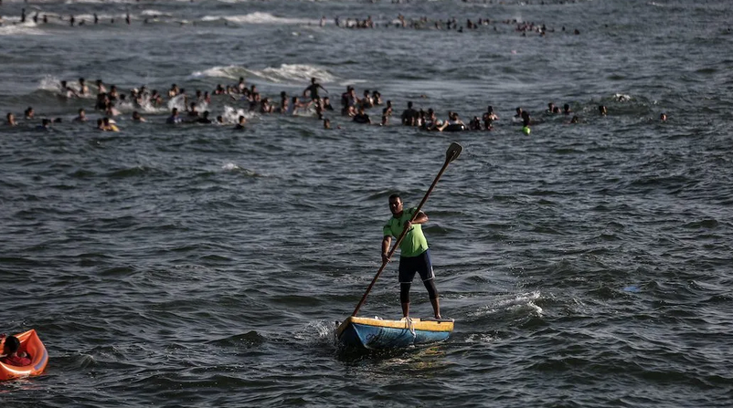 With eyes on the waves, Gaza surfers keep boards handy