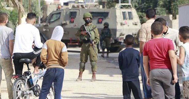 Two Palestinians injured by IOF gunfire in western Jericho